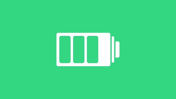 Bílá indikátor stavu nabití baterie ikona izolované na zeleném pozadí. Grafická animace pohybu videa 4K - Záběry, video