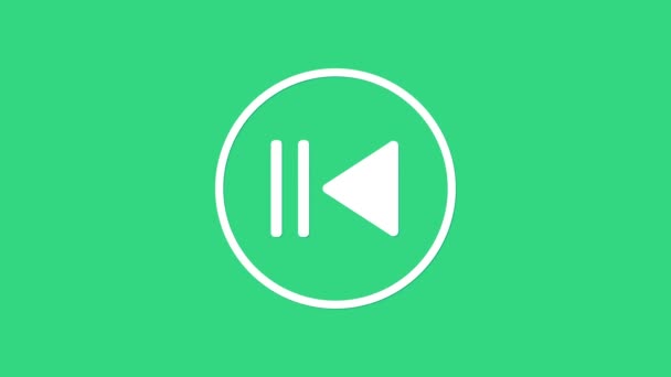 Fehér Visszatekerés ikon elszigetelt zöld alapon. 4K Videó mozgás grafikus animáció - Felvétel, videó