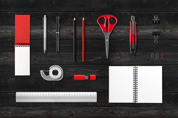 Stationery, office supplies mockup template, isolated on black wood background - 写真・画像