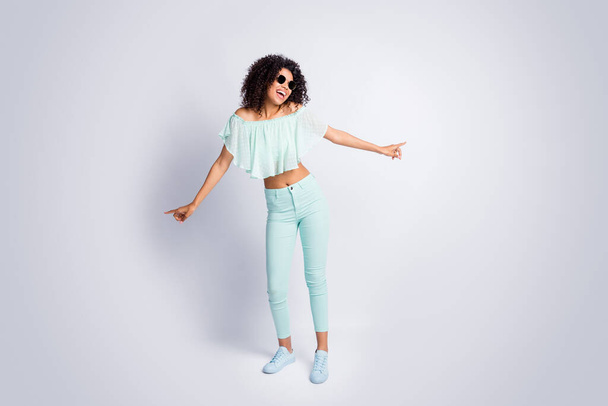 Full length body size photo of beautiful mulatto curly girl wearing sunglass dancing laughing at party isolated on grey color background - Valokuva, kuva