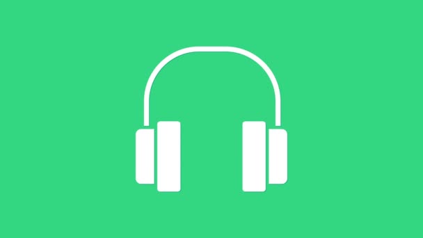 緑色の背景に隔離されたホワイトのヘッドフォンアイコン。イヤフォン。音楽、サービス、コミュニケーション、オペレーターの話を聞くためのコンセプト。4Kビデオモーショングラフィックアニメーション - 映像、動画