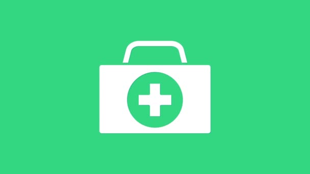 Белый значок аптечки на зеленом фоне. Медицинская коробка с крестом. Медицинское оборудование для чрезвычайных ситуаций. Концепция здравоохранения. Видеографическая анимация 4K - Кадры, видео