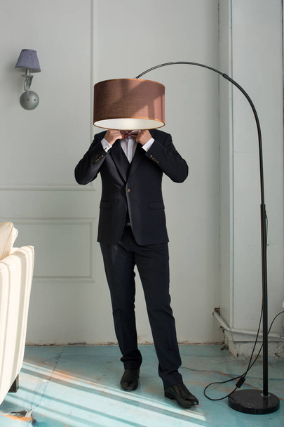 Anonymous Man in Suit Straightens Bow Tie - Φωτογραφία, εικόνα
