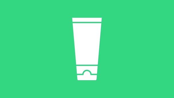 Icono de tubo cosmético de crema blanca o loción aislado sobre fondo verde. Productos para el cuidado del cuerpo para hombres. Animación gráfica de vídeo 4K - Imágenes, Vídeo