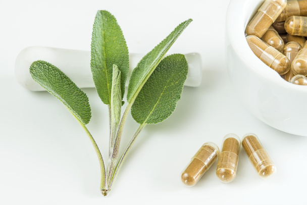 Sage leaves with herbal pills - Photo, Image