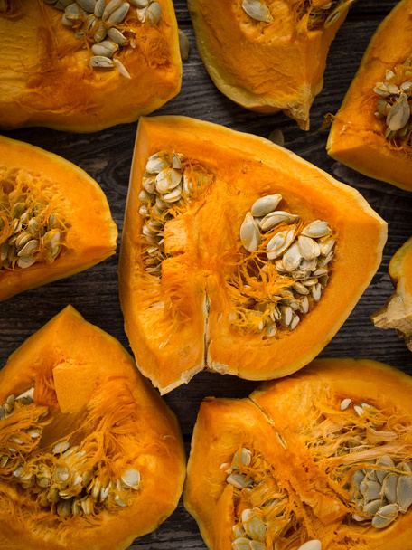 Raw pumpkin on a wooden table - Photo, Image