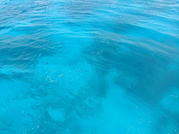 Blauwe golf, rimpel, zee textuur, oceaan, achtergrond. - Foto, afbeelding