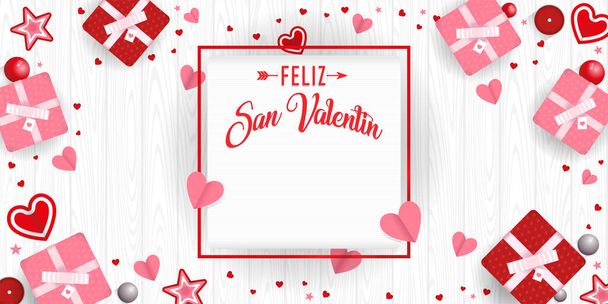 FELIZ SAN VALENTIN - Feliz Dia dos Namorados em espanhol - em uma moldura quadrada cercada por caixas de presente, corações, estrelas e bolas vermelhas e rosa sobre fundo branco de madeira. Imagem vetorial - Vetor, Imagem