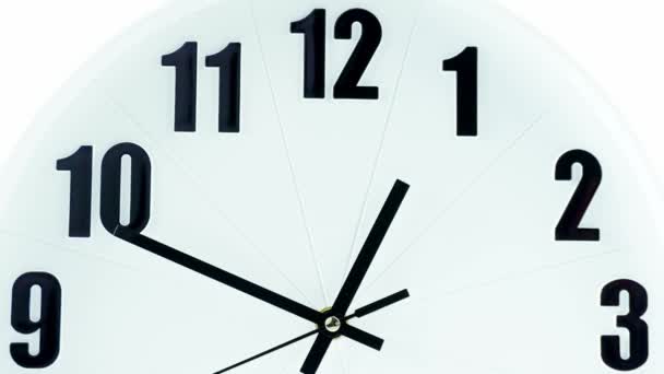 Wall clock on white background Startime 12.45 am, Time lapse 30 minutes. - Footage, Video