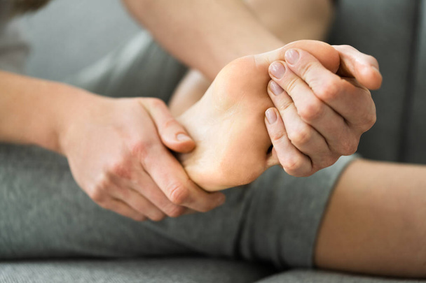 Applying Lotion Or Cream On Hard Feet Skin - Фото, изображение