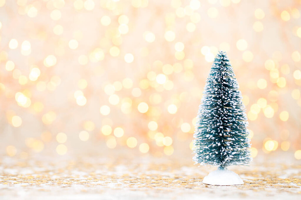 Christmas wooden decorations on a bokeh background. - Foto, afbeelding