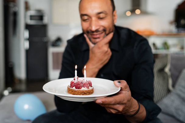 40 years old man celebrating his birthday at home - Fotografie, Obrázek