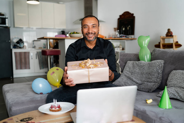 40 years old man celebrating his birthday at home - Valokuva, kuva