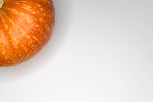 half orange ripe pumpkin isolated on white background - Foto, Imagem