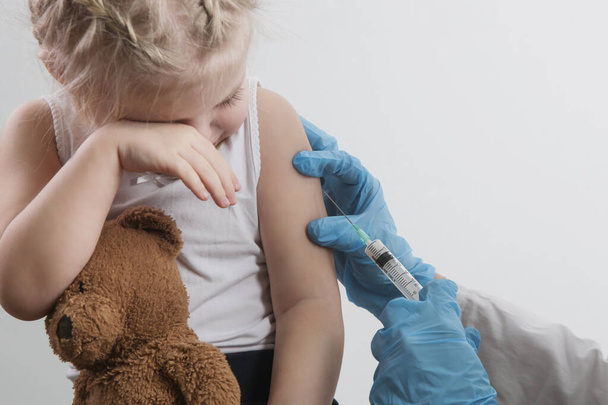 Children vaccination. Healthcare and medical concept. Immunization program from infectious diseases. - Photo, Image