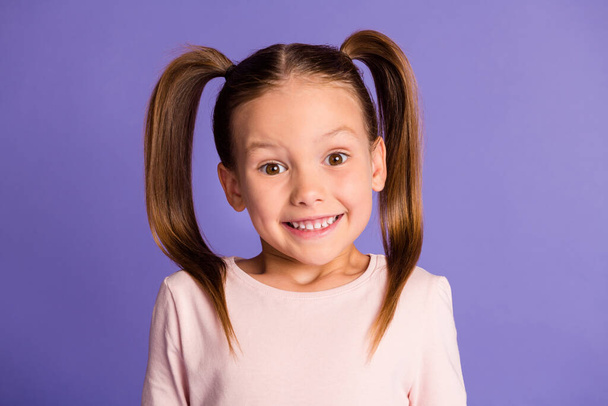 Photo of happy cheerful little girl wear sweatshirt excited smile isolated on violet purple color background - Φωτογραφία, εικόνα