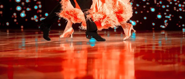 Man and woman dancer latino international dancing. Ballroom dancing is a team sport. Vintage color filter. - Photo, Image