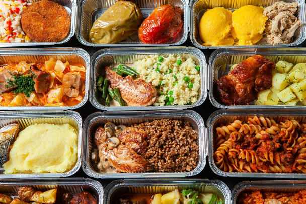 Business lunch in eco plastic container ready for delivery.Top view. Office Lunch boxes with food ready to go. Food takes away. Catering, brakfast. - Photo, Image
