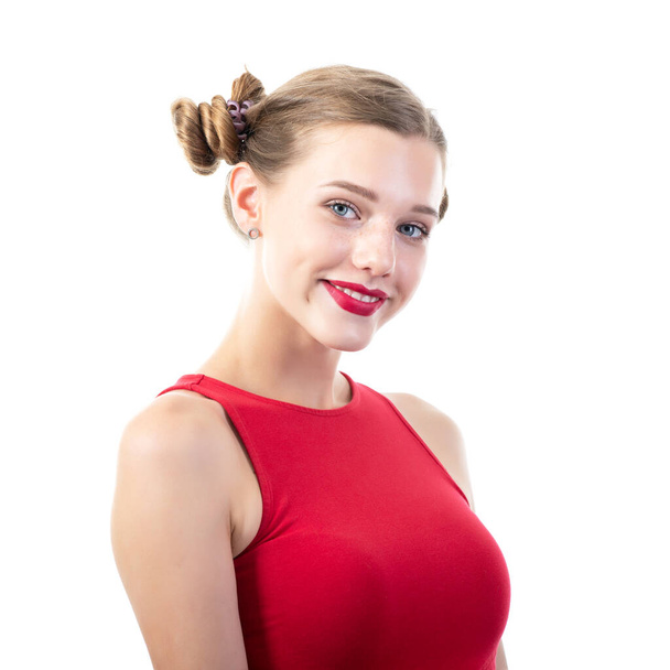 Charming teen girl wearing red top, portrait over white background.  - Foto, Imagem