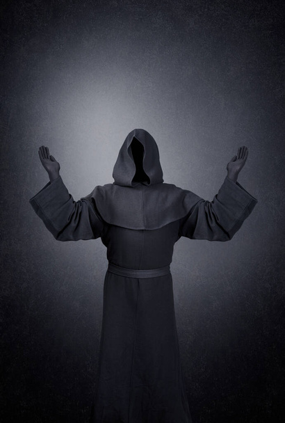 Ghostly figure with hands up in the dark - Zdjęcie, obraz