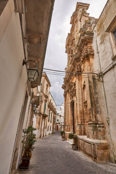 Typical Street Scene Of The Historical Center of Martina Franca, A Village In Puglia, Apulia, Italy On A Cloudy Rainy Day - Photo, Image