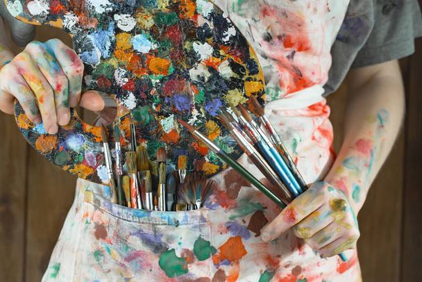 Woman's hand with paint brush. - Fotografie, Obrázek