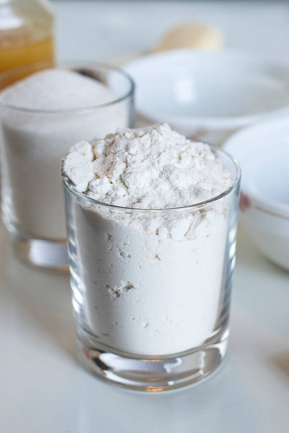 ingredients for cooking, white flour in a glass - Photo, Image