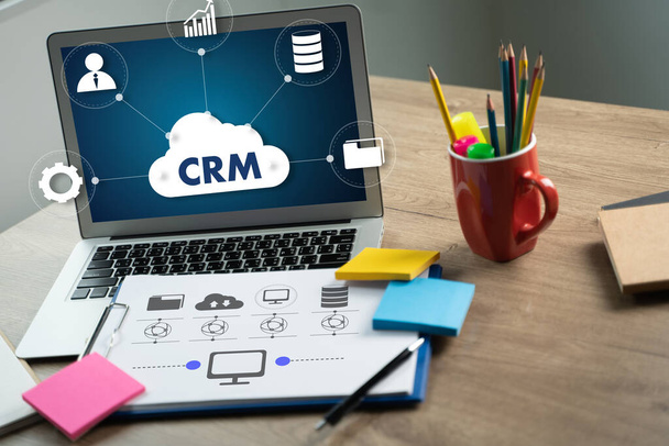 CRM Business Customer CRM Management Analysis Service Concept Business team hands at work with financial reports and a laptop - Φωτογραφία, εικόνα