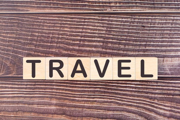 TRAVEL word made with wood building blocks - Foto, imagen