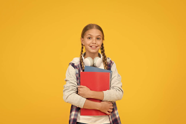 School lesson. Study literature. Towards knowledge. Learn following rules. Modern school student. Free courses. Welcome back to school. Motivate kids for academic year ahead. School girl hold books - Foto, imagen