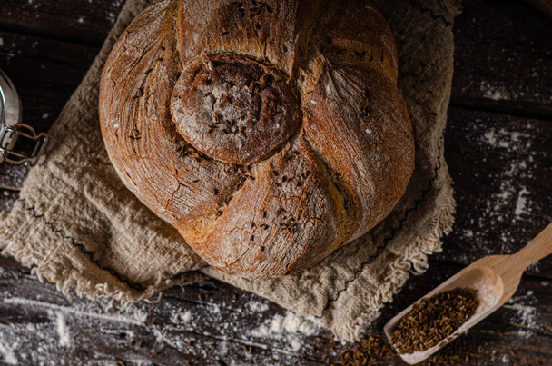 Delicious and simple bread with cumin and little garlic - Photo, Image