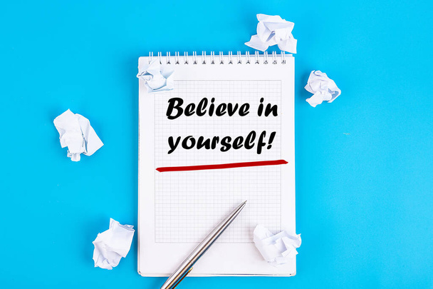 Business concept - Top view notebook writing Believe in yourself - Фото, зображення