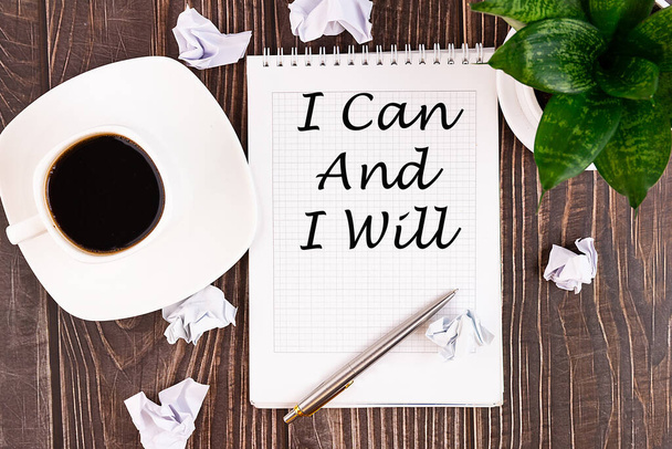 I can and I will motivational concept - handwriting on a notebook with pen and a cup of coffee - Photo, image