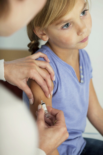 VACCINATING A CHILD - Photo, image