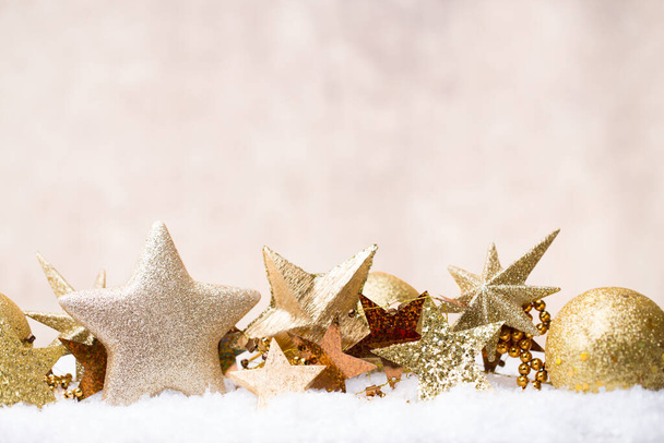 Christmas glossy decor golden star and ball. - Photo, Image