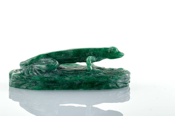 beautiful statuette of lizard salamander from malachite on a white background close-up - Photo, Image