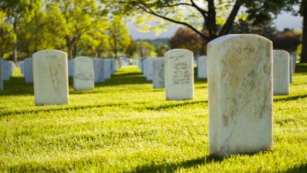 Denver, Colorado, USA-May 26, 2019 - An endless rows of white marble gravestones at th - Fotó, kép