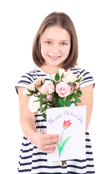 Beautiful little girl with flowers and postcard in her hand, isolated on white - Foto, immagini