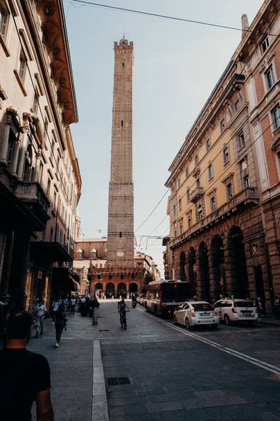 BOLOGNA, ITALY - SEPTEMBER 30, 2019: view of Torre Garisenda and Torre Degli Asinelli leaning towers Due Torri. Meaning Two towers - Zdjęcie, obraz