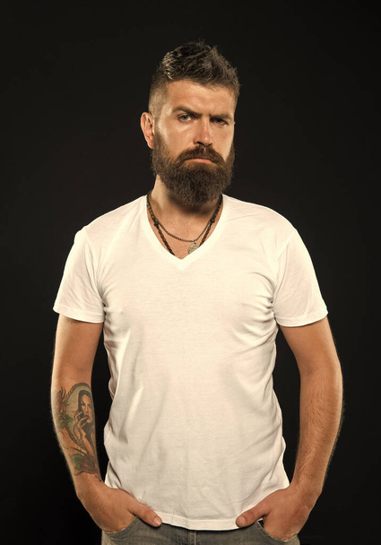Bearded confident hipster. Beard fashion and barber concept. Man handsome hipster stylish beard and mustache. Barber tips maintain beard. Styling and trimming beard care. Beauty and masculinity - Foto, imagen