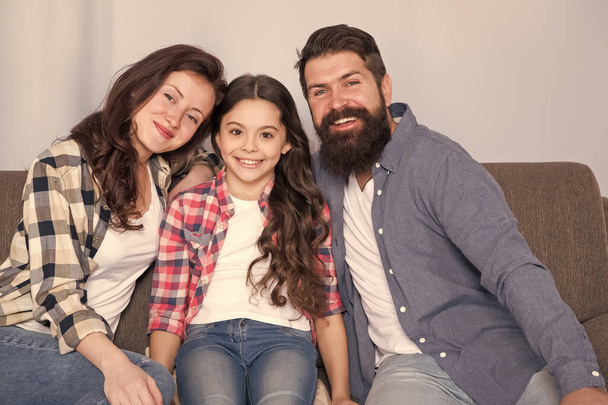 Happy family together. little girl child with parents. trust and relative bonds. bearded man and woman with child. happy family relax at home. family weekend. mother and father love daughter child - Φωτογραφία, εικόνα