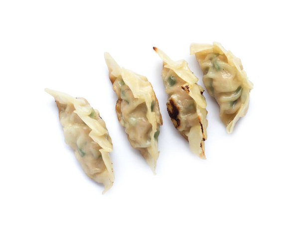 Picture of fried dumplings or gyoza isolated on white background - Foto, Imagen