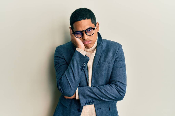 Young handsome hispanic man wearing elegant clothes and glasses thinking looking tired and bored with depression problems with crossed arms.  - Fotoğraf, Görsel