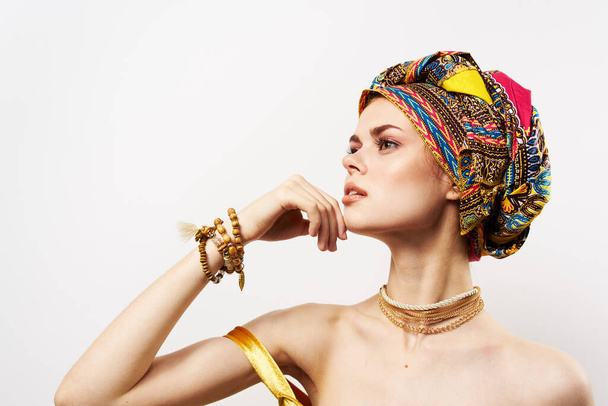 pretty oriental woman multicolored turban jewelry bare shoulders luxury - Photo, Image