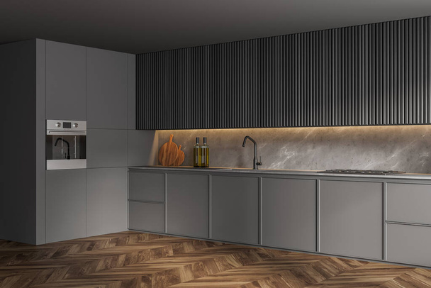 Wooden and gray kitchen corner with gray walls, wooden floor and built in sink and cooker. 3d rendering - Photo, image