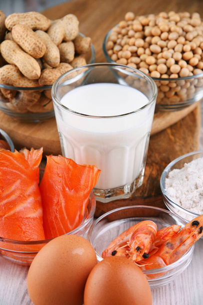 Composition with common food allergens including egg, milk, soya, peanuts, hazelnut, fish, seafood and wheat flour - Photo, Image