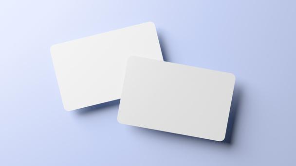 Στρογγυλεμένες γωνίες επαγγελματικές κάρτες mock up για το πρότυπο σχεδιασμού. Λευκά πιστωτική κάρτα mockup μπροστά και πίσω σε ένα μπλε φόντο σε ρεαλιστική 3D απόδοση - Φωτογραφία, εικόνα