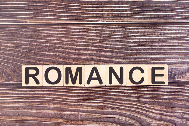 ROMANCE word made with wood building blocks - Foto, imagen
