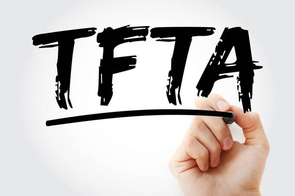 TFTA - Τριμερής ζώνη ελεύθερων συναλλαγών ακρωνύμιο με δείκτη, επιχειρηματικό υπόβαθρο έννοια - Φωτογραφία, εικόνα