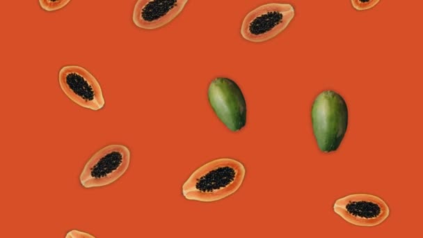 Putoavat papaijat abstrakti tausta. 4K jatkuva silmukka. Kausijuhla. Kesähedelmäkäsite. - Materiaali, video